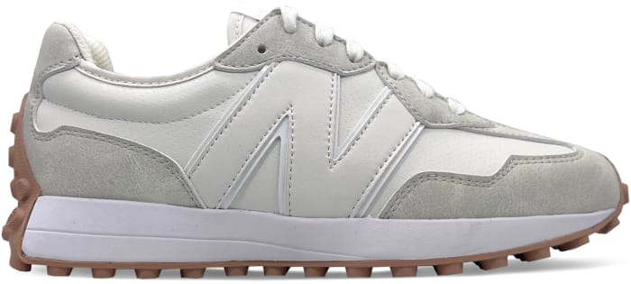 Side view of a white and grey New Balance golf shoe.